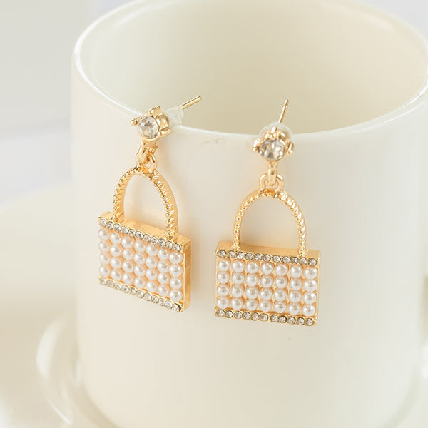 White Pearl Clutch Earrings — Buy Any 5 for Rs. 599
