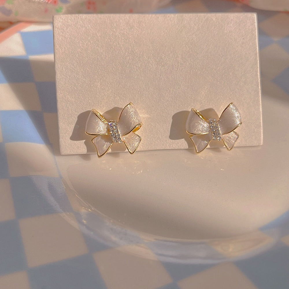 White Bow Stud Earrings