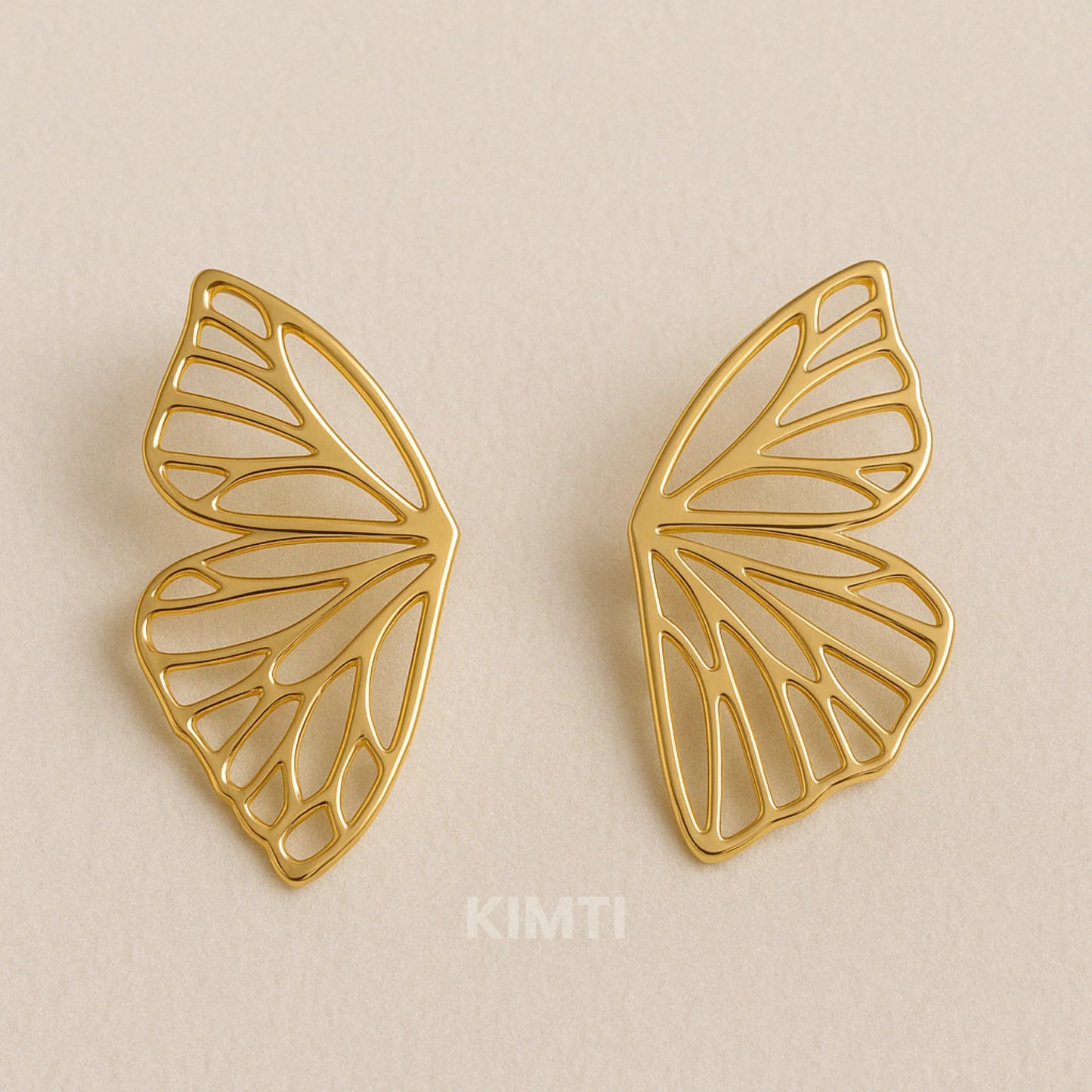 Butterfly Kiss Golden Drop Earring — Buy Any 5 for Rs. 599